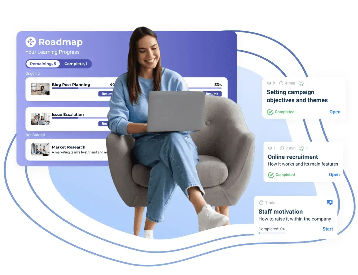 A woman with a laptop using LMS, looking at a roadmap