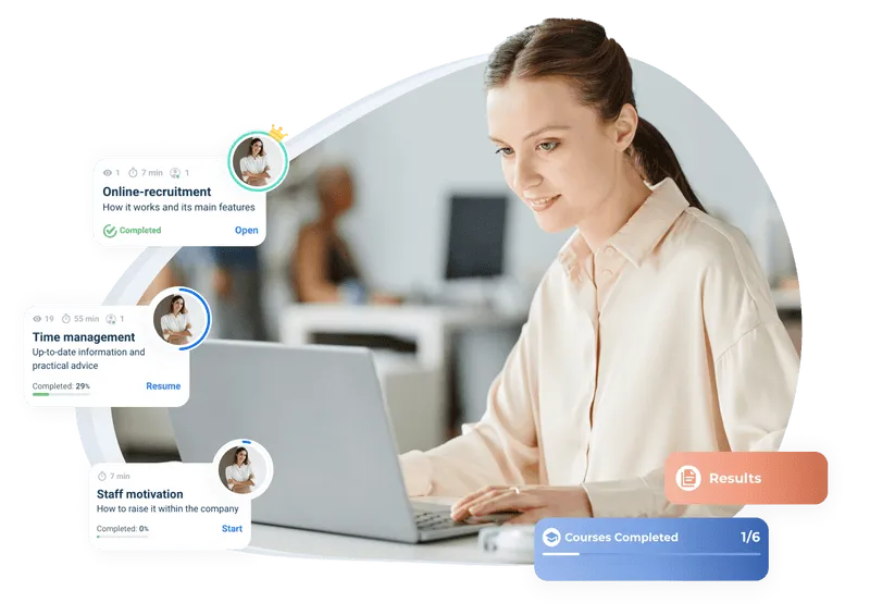 Woman sitting in front of a laptop checking the learning courses